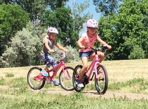 riding bikes at denver summer camp
